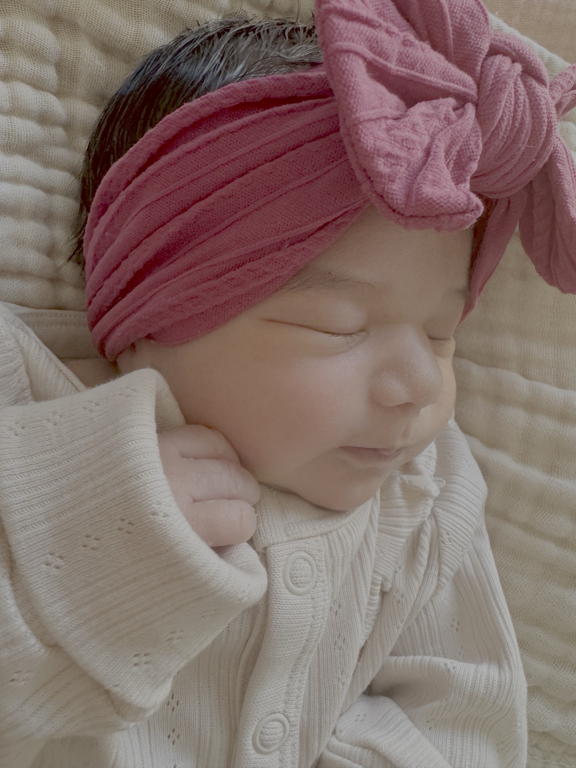 Delina as a newborn sleeping